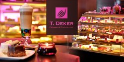 DZI� T�USTY CZWARTEK Redakcja oraz cukiernia T.Deker organizuj� "Zawody w jedzeniu p�czk�w"